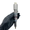 Single Caterpillar diesel fuel injector view 2