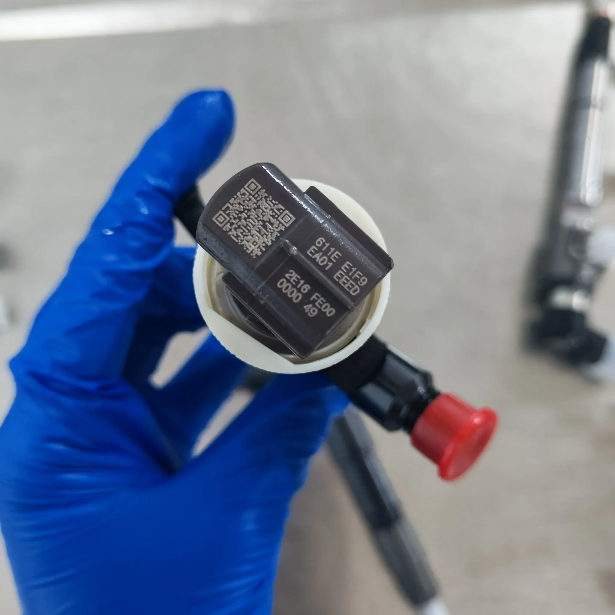 295050-0810 injector correction code QR label close-up